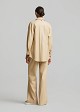 Longline leather look shirt with belt and details