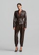 Jacket in leather look with belt