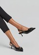 Kitten heel pumps with appliqué bow