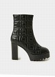 High-heeled quilted boots