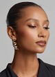Twisted drop earrings in golden look