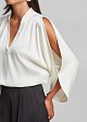 Top with cut-out details and a satin finish
