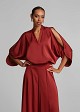 Top with cut-out details and a satin finish