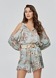 Printed blouse in satin look and cut out sleeves