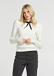 Knitted blouse with a bow