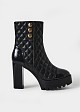 Quilted high heel boot