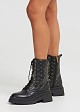 Quilted boots με studs