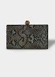 Clutch bag with snake material