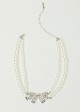 Faux pearls necklace with embellishment bow