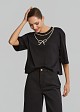 Crop top with a pearl-adorned bow detail