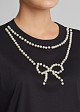 Crop top with a pearl-adorned bow detail