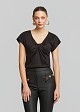 Solid-color blouse with knot