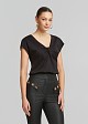 Solid-color blouse with knot