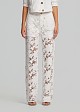 Denim pants in embossed lace