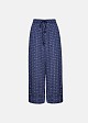 Satin look pants in logo print