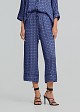 Satin look pants in logo print