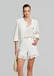 White denim cropped jacket with lace detailing