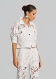 Denim jacket in embossed lace