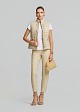 Sleeveless jacket in frills