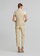 Sleeveless jacket in frills