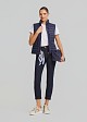 Sleeveless jacket in frills