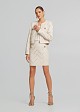 Mini skirt in laser cut design and leather look