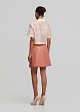 Pleated mini skirt with a silky finish