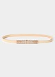 Metal, elastic belt in a gold finish with geometric details on the buckle