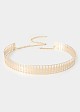 Rigid metal belt with cut-outs