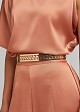 Gold-tone metallic belt with geometric design