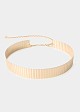Metal belt with embossed design