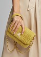 Quilted bag with embossed suede look texture