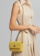 Quilted bag with embossed suede look texture