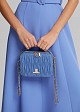 Quilted handbag with suede