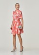 Floral printed cloche dress in peach color with rhinestones