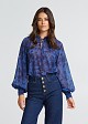 Floral blouse with ruffles on the neck